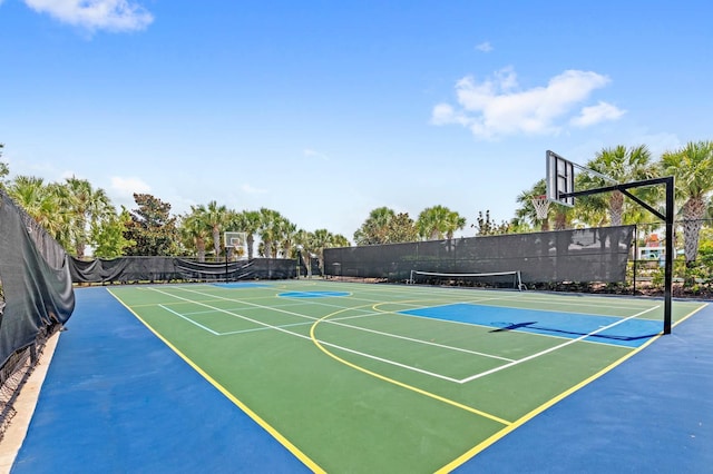 view of basketball court featuring tennis court