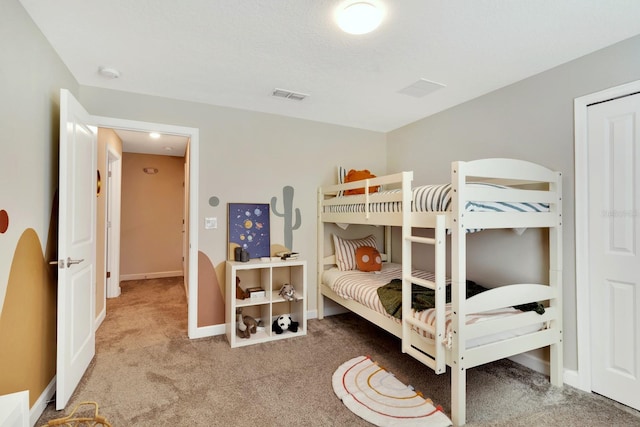 bedroom featuring carpet