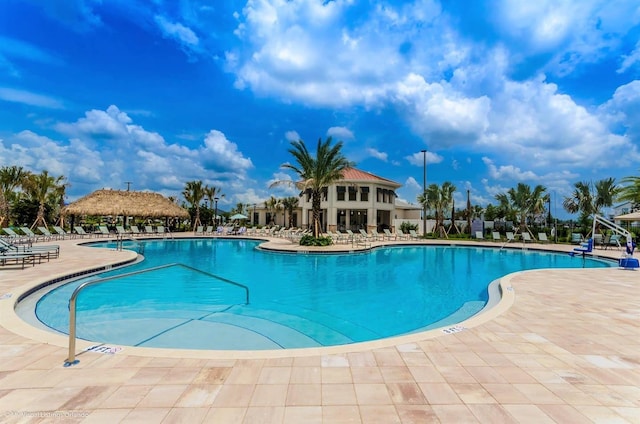 view of pool featuring a patio area