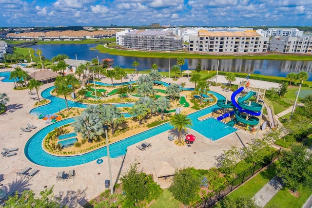 birds eye view of property featuring a water view