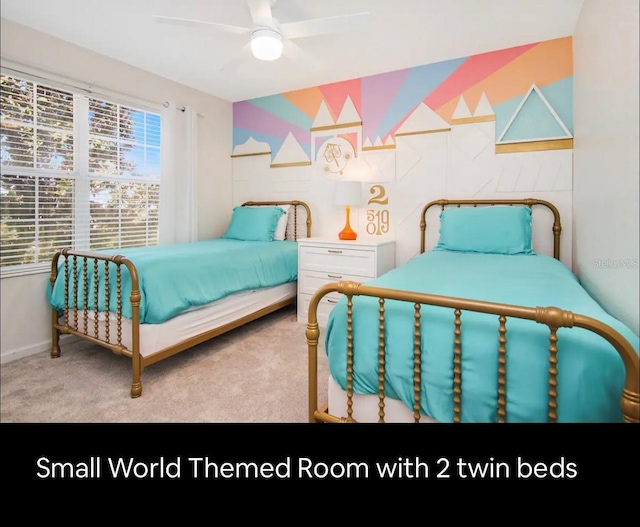 bedroom with ceiling fan and light carpet