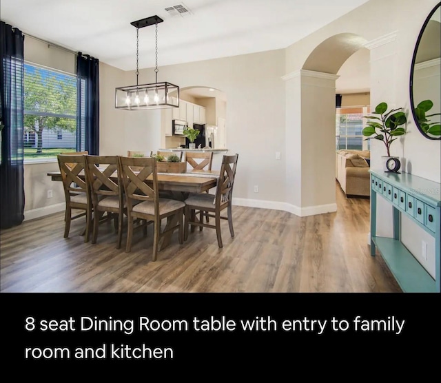 dining area featuring hardwood / wood-style flooring