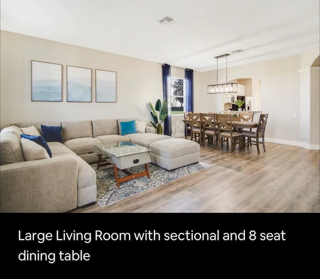 living room with hardwood / wood-style floors