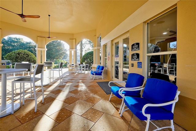 view of patio / terrace featuring ceiling fan