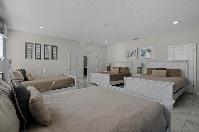 bedroom with a textured ceiling