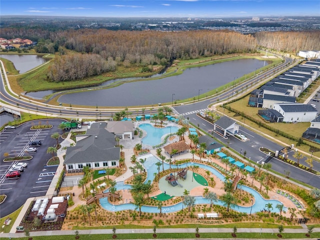 birds eye view of property with a water view