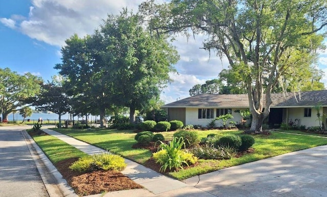 exterior space featuring a front lawn