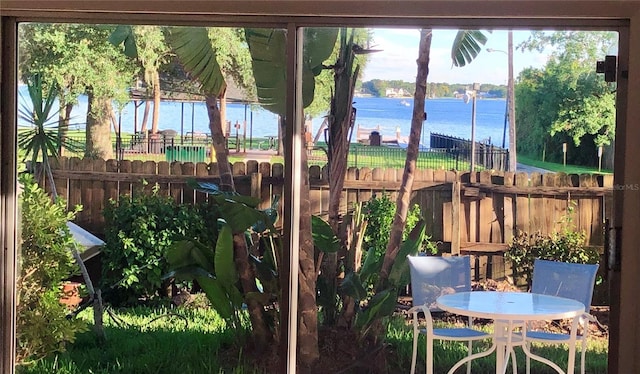 sunroom with a water view