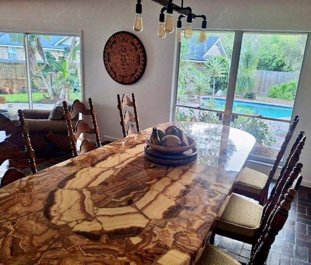 dining space with a healthy amount of sunlight