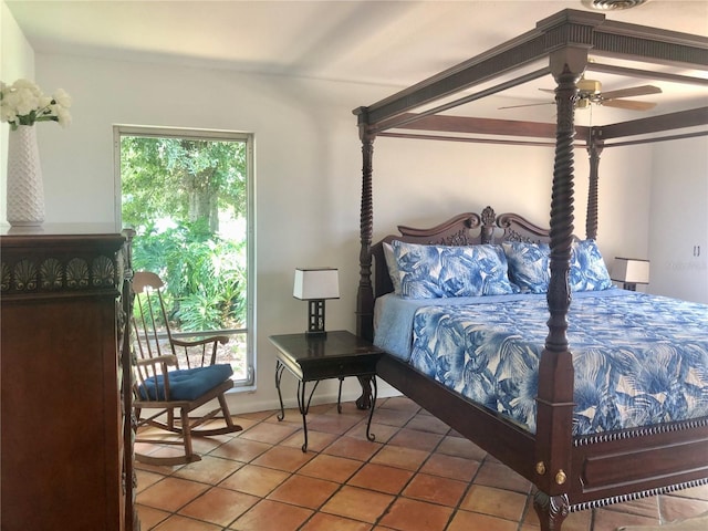 bedroom with light tile patterned floors and ceiling fan