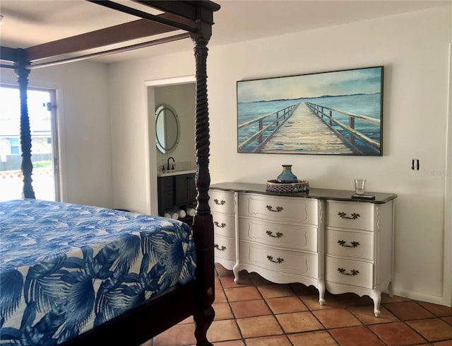 tiled bedroom featuring sink