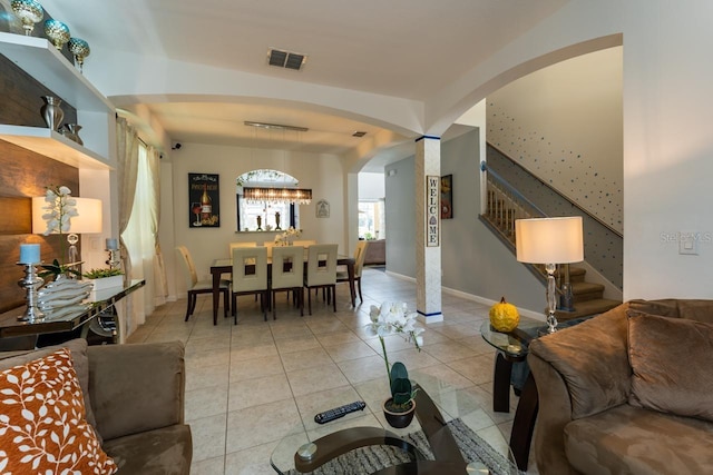 living room with light tile patterned floors