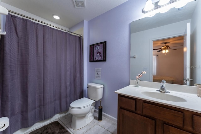 full bathroom with toilet, vanity, shower / bath combo, and tile patterned floors