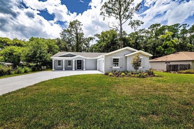 single story home with a front yard