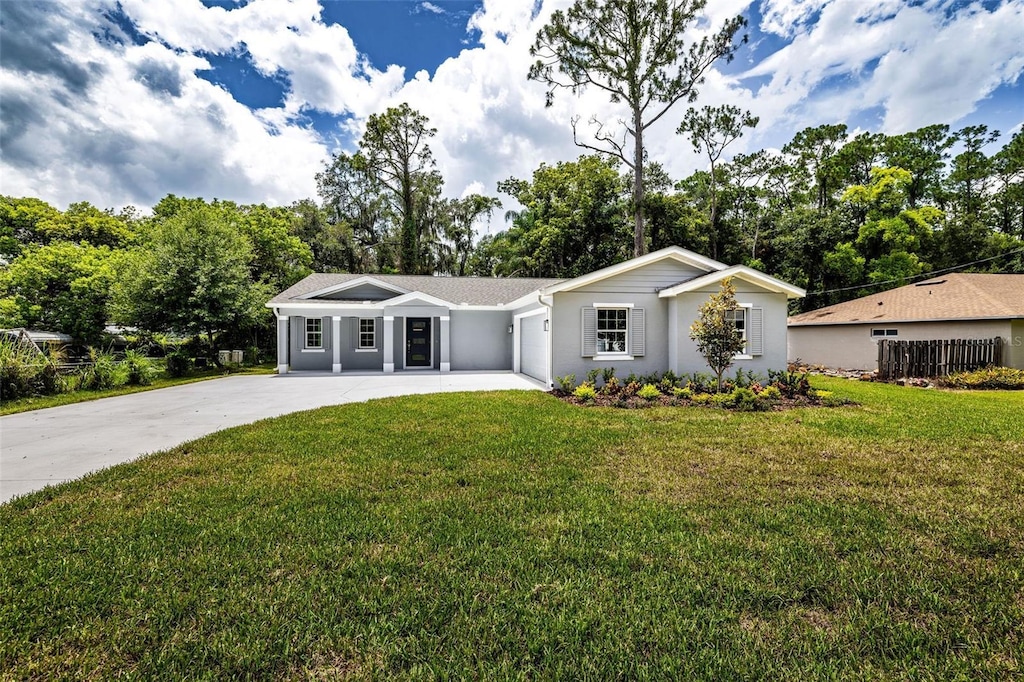 ranch-style home with a front yard