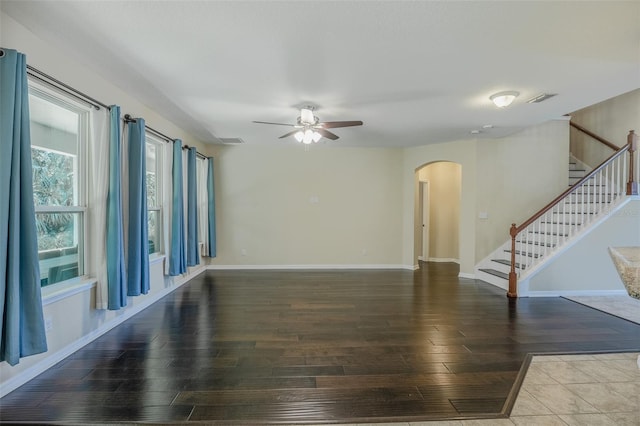 empty room featuring ceiling fan and wood-type flooring