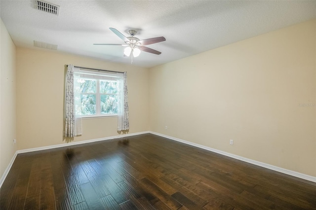 unfurnished room with hardwood / wood-style flooring, a textured ceiling, and ceiling fan