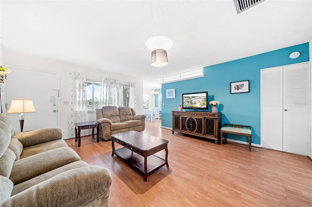 living room with hardwood / wood-style floors