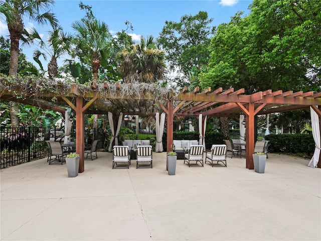 view of community with a pergola and a patio area