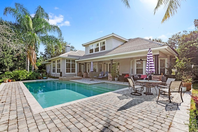 view of swimming pool with an outdoor hangout area and a patio area