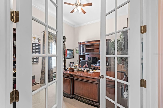 carpeted office featuring ornamental molding, french doors, and ceiling fan