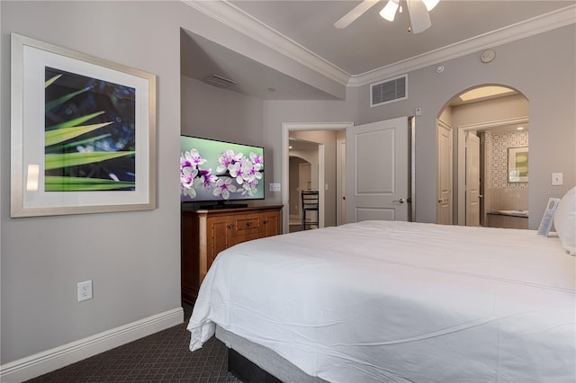 carpeted bedroom with crown molding and ceiling fan