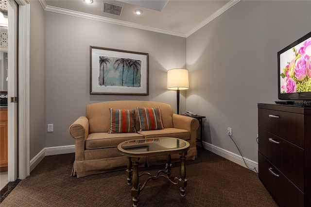 living area with ornamental molding and dark colored carpet