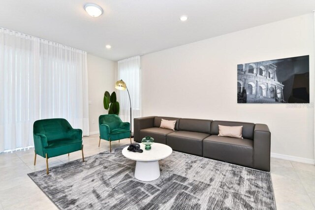 living room featuring light tile patterned flooring