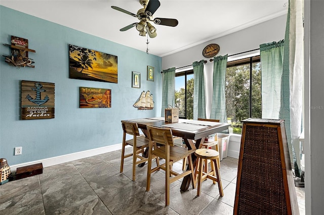 dining space with ceiling fan