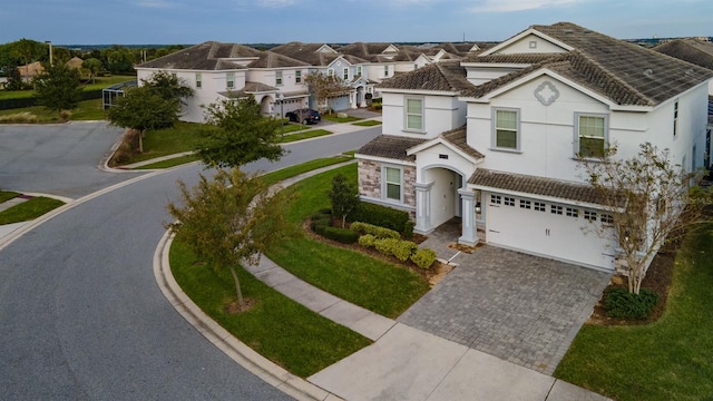 9076 Hazard St, Davenport, FL 33896 - view of front facade featuring a garage