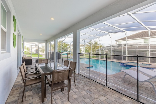 sunroom / solarium featuring a pool