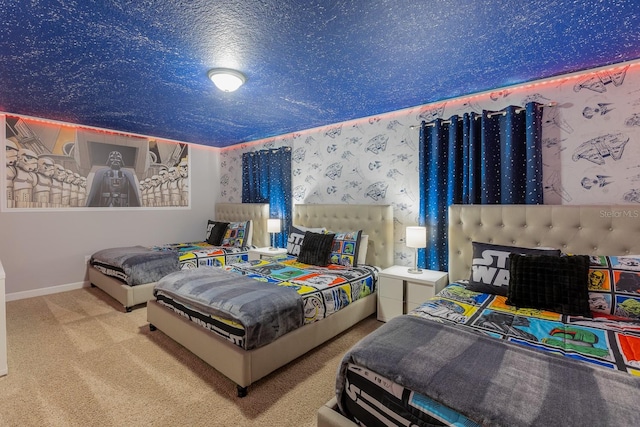 carpeted bedroom featuring a textured ceiling