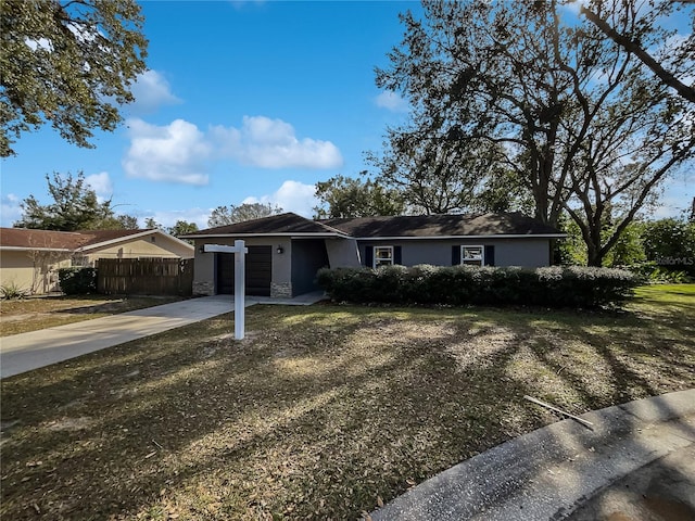 ranch-style home with a garage