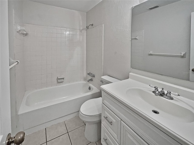 full bathroom featuring tile patterned flooring, vanity, toilet, and bathing tub / shower combination