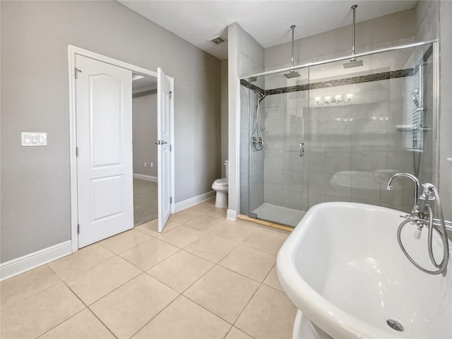 bathroom with independent shower and bath, toilet, and tile patterned floors