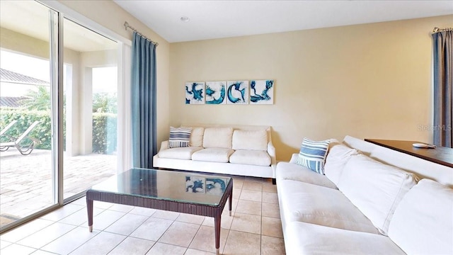 living room with light tile patterned floors