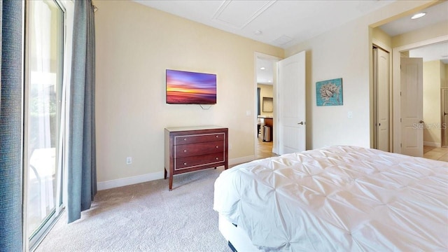 bedroom with light carpet