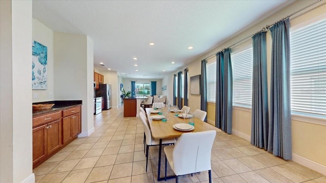 dining room with light tile patterned floors