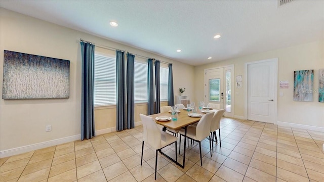 view of tiled dining space