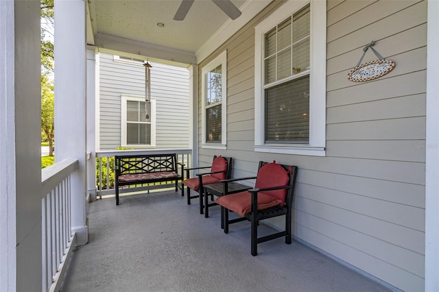 balcony with ceiling fan and covered porch