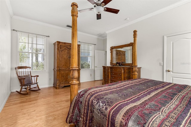 bedroom with crown molding, ceiling fan, and light hardwood / wood-style flooring