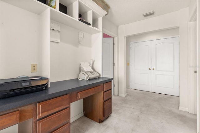 mudroom featuring built in desk