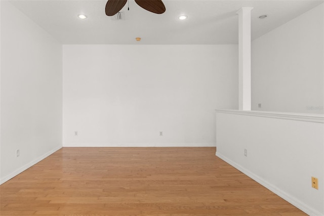 unfurnished room featuring ceiling fan and light hardwood / wood-style floors