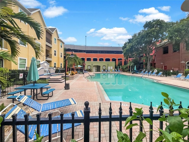 view of pool featuring a patio