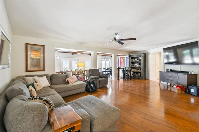 living room featuring ceiling fan, wood-type flooring, and french doors