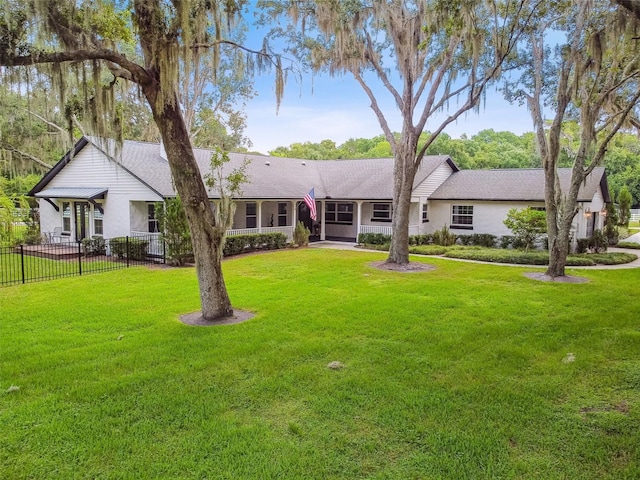 single story home with a front yard