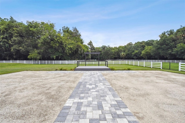 view of patio / terrace featuring a rural view