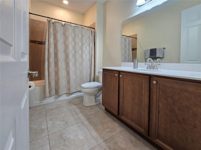 full bathroom featuring tile patterned flooring, vanity, shower / bath combination with curtain, and toilet