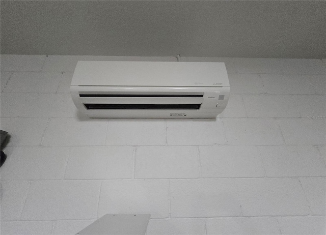 interior details featuring a wall mounted AC