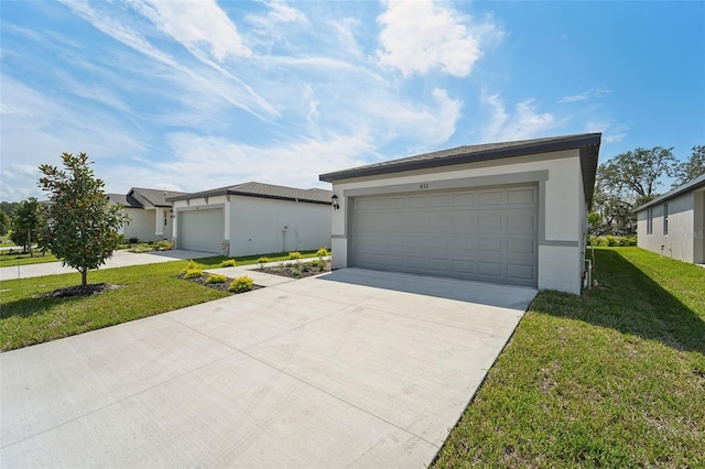 ranch-style house featuring a front yard and a garage